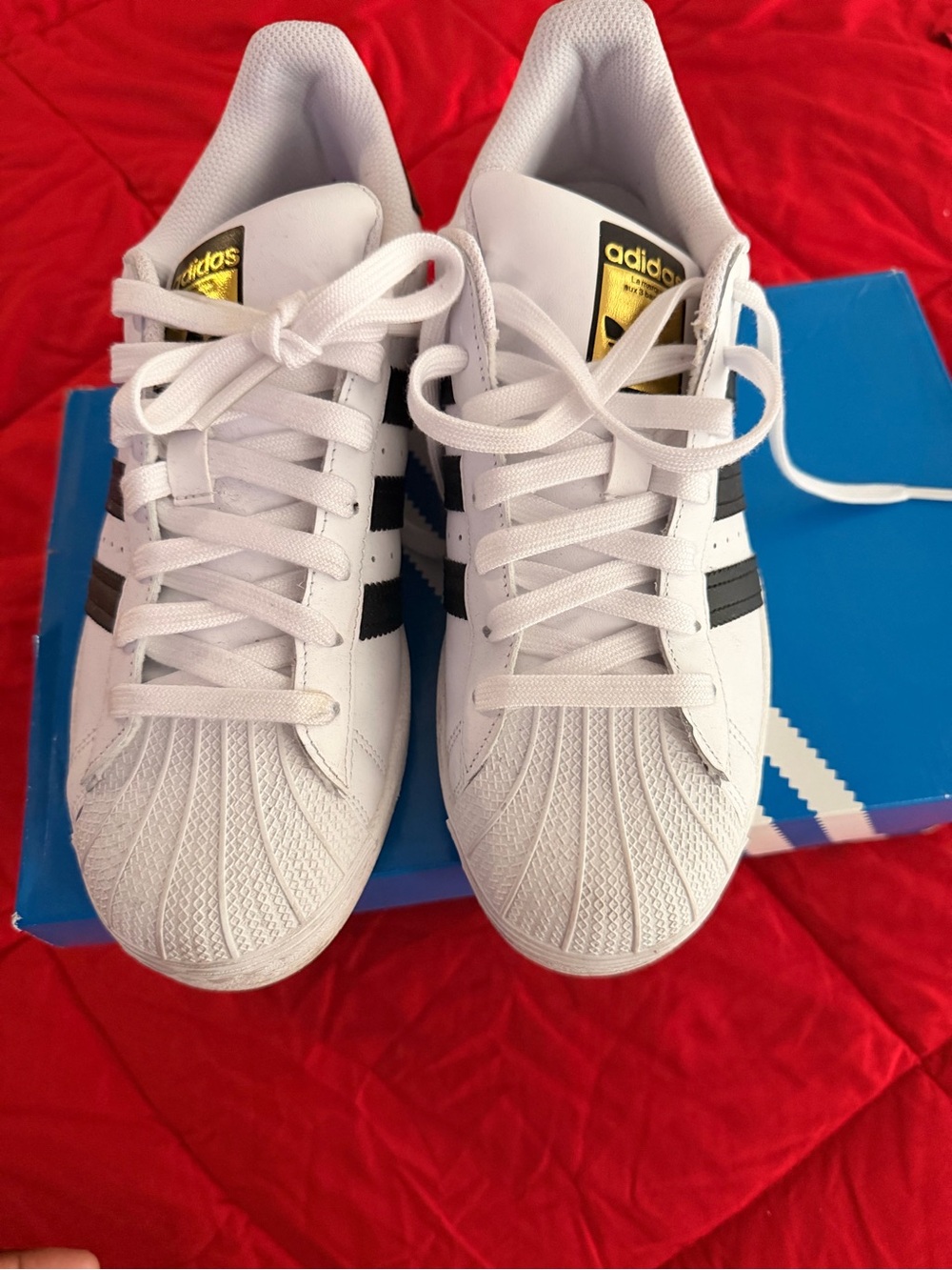 Adidas White Sneakers with Black Stripes and Gold Tongue Tab
